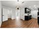 Open concept kitchen with hardwood floors, modern cabinets, and stainless steel appliances at 801 Arbor Hill Dr, Stone Mountain, GA 30088