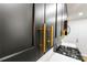 Close-up of kitchen cabinets with sleek gold hardware and modern backsplash at 801 Arbor Hill Dr, Stone Mountain, GA 30088