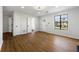 Bright living room with hardwood floors, fresh white paint, and modern trim work at 801 Arbor Hill Dr, Stone Mountain, GA 30088