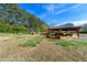 A nice community pavilion with picnic tables, seating, and playground equipment at 801 Arbor Hill Dr, Stone Mountain, GA 30088