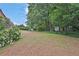 The expansive backyard is the perfect canvas for outdoor activities and enjoying the surrounding natural beauty at 962 Cove Lake Ct, Lawrenceville, GA 30045
