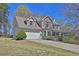 Lovely two-story home with a two-car garage and a charming front porch at 962 Cove Lake Ct, Lawrenceville, GA 30045