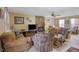 Comfortable living room with a fireplace and assorted furniture at 962 Cove Lake Ct, Lawrenceville, GA 30045