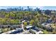 Scenic aerial view of townhome community in a park-like setting, boasting a desirable urban location at 13 Ivy Ne Sq, Atlanta, GA 30342
