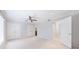 Spacious bedroom with plush carpet, ceiling fan, and ample closet space at 13 Ivy Ne Sq, Atlanta, GA 30342