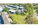 Well-maintained townhomes showcase a lush lawn area and mature trees, perfect for outdoor enjoyment at 13 Ivy Ne Sq, Atlanta, GA 30342