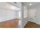Inviting entryway featuring pristine white walls and beautiful dark hardwood floors at 13 Ivy Ne Sq, Atlanta, GA 30342