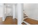 Home entryway with wooden floors with a view of the staircase at 13 Ivy Ne Sq, Atlanta, GA 30342