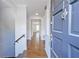 Inviting hallway with hardwood floors leads to various rooms in this well-maintained home at 13 Ivy Ne Sq, Atlanta, GA 30342