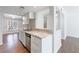 Bright kitchen features granite countertops, stainless steel appliances, and lots of storage at 13 Ivy Ne Sq, Atlanta, GA 30342