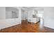 Open concept living room with access to kitchen and staircase to the second floor at 13 Ivy Ne Sq, Atlanta, GA 30342