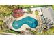 An aerial shot showcases the covered pool surrounded by foliage at 13 Ivy Ne Sq, Atlanta, GA 30342