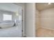 Ensuite bathroom featuring a soaking tub and walk-in closet at 2781 Dolce Rd, Dacula, GA 30019