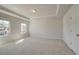 Spacious bedroom with large windows that provide natural light and trey ceiling at 2781 Dolce Rd, Dacula, GA 30019