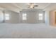 Spacious bonus room featuring neutral carpet, recessed lights and tray ceiling creating a comfortable retreat at 2781 Dolce Rd, Dacula, GA 30019