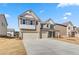 Elegant brick home with a three-car garage and a spacious driveway set in a suburban neighborhood at 2781 Dolce Rd, Dacula, GA 30019