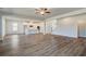 Open floorplan showcasing the kitchen with island and the spacious living area at 2781 Dolce Rd, Dacula, GA 30019