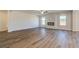 Spacious living area featuring a modern fireplace and lots of natural light at 2781 Dolce Rd, Dacula, GA 30019