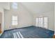 Bright bedroom with vaulted ceilings and a large window with plenty of natural light at 321 Covered Bridge Sw Pl, Smyrna, GA 30082