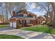 Well-maintained brick home with an attached two-car garage and a spacious driveway at 321 Covered Bridge Sw Pl, Smyrna, GA 30082