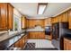 Modern kitchen with stainless steel appliances, granite countertops, and ample cabinet space at 321 Covered Bridge Sw Pl, Smyrna, GA 30082