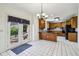 Spacious kitchen with oak cabinets, stainless appliances, and an adjacent dining area at 321 Covered Bridge Sw Pl, Smyrna, GA 30082