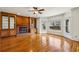 Bright living room with hardwood floors, built-in cabinets, and a cozy fireplace at 321 Covered Bridge Sw Pl, Smyrna, GA 30082