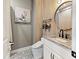 Stylish bathroom featuring patterned tile floor and granite topped vanity at 8470 Wallace Tatum Rd, Cumming, GA 30028
