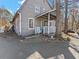 Charming home exterior with gray siding, white trim, and inviting front porch at 8470 Wallace Tatum Rd, Cumming, GA 30028