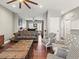 Comfortable living room featuring stylish seating and hardwood floors at 8470 Wallace Tatum Rd, Cumming, GA 30028