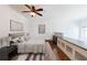 Bright bedroom featuring a ceiling fan, and modern decor, creating a welcoming atmosphere at 1221 Caroline Ne St # 201, Atlanta, GA 30307