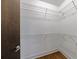 Walk-in closet with wire shelving, providing ample storage space for an organized wardrobe at 1221 Caroline Ne St # 201, Atlanta, GA 30307