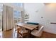 Bright dining room with hardwood floors, large windows, and neutral decor at 1221 Caroline Ne St # 201, Atlanta, GA 30307