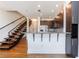 Open floorplan with breakfast bar leading to the kitchen with stainless steel appliances at 1221 Caroline Ne St # 201, Atlanta, GA 30307