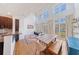 Open floor plan features kitchen with granite counters, and hardwood floors leading to large bright windows at 1221 Caroline Ne St # 201, Atlanta, GA 30307