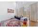 Bright living room with high ceilings, large windows, and comfortable seating area at 1221 Caroline Ne St # 201, Atlanta, GA 30307