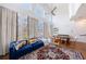 Sun-drenched living room with floor-to-ceiling windows and an open layout to the dining area at 1221 Caroline Ne St # 201, Atlanta, GA 30307