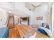 Bright living room featuring high ceilings, hardwood floors, modern staircase, and a comfortable blue sofa at 1221 Caroline Ne St # 201, Atlanta, GA 30307