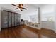 Open loft space with hardwood flooring, display shelving, and a large closet at 1221 Caroline Ne St # 201, Atlanta, GA 30307