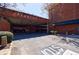 Street view of a parking garage with a brick facade and large 'Parking' sign at 1221 Caroline Ne St # 201, Atlanta, GA 30307