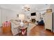 Spacious living room featuring hardwood floors, fireplace, and custom built-ins at 300 South Village Sq, Canton, GA 30115