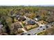 Community aerial view highlighting the lush landscape, nearby road, and the Atlanta skyline in the distance at 950 Clairemont Ave, Decatur, GA 30030