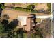 Aerial view of the house showcasing its well-maintained roof, driveway, and surrounding greenery at 950 Clairemont Ave, Decatur, GA 30030