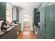 Sleek kitchen with blue cabinets, hardwood floors, and stainless steel appliances at 950 Clairemont Ave, Decatur, GA 30030