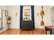 Stylish interior featuring a bar cabinet, guitars on the wall and an adjacent work desk at 950 Clairemont Ave, Decatur, GA 30030