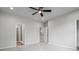 Neutral bedroom featuring doors to bathroom and closet at 58 Black Gum Ln # 47, Auburn, GA 30011