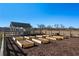 Community garden featuring raised garden beds and a picnic shelter, enclosed by a split rail fence at 58 Black Gum Ln # 47, Auburn, GA 30011