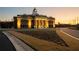 Striking view of a municipal complex at dusk, featuring classic architectural design and manicured landscaping at 58 Black Gum Ln # 47, Auburn, GA 30011