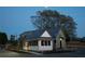 Charming building exterior with detailed architecture and a well-maintained landscape under a night sky at 58 Black Gum Ln # 47, Auburn, GA 30011