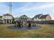 Gather around this community fire pit with plenty of seating at 58 Black Gum Ln # 47, Auburn, GA 30011